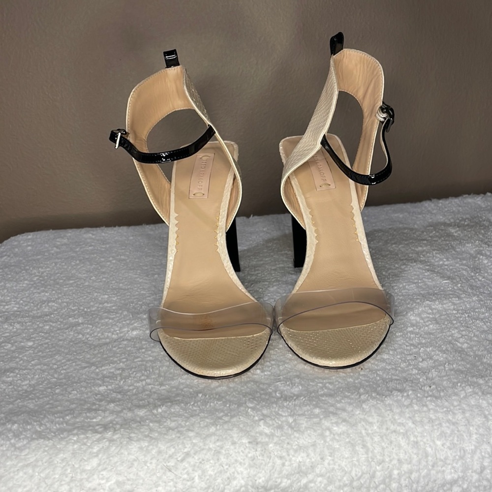 New ! Never worn Reed Krakoff heals.  Unique clear acrylic!